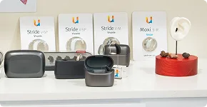 Range of hearing aid devices on display in the clinic